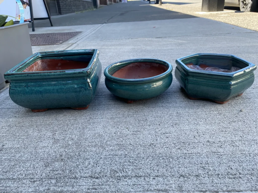 Three handmade green-glazed bonsai pots from Bát Tràng