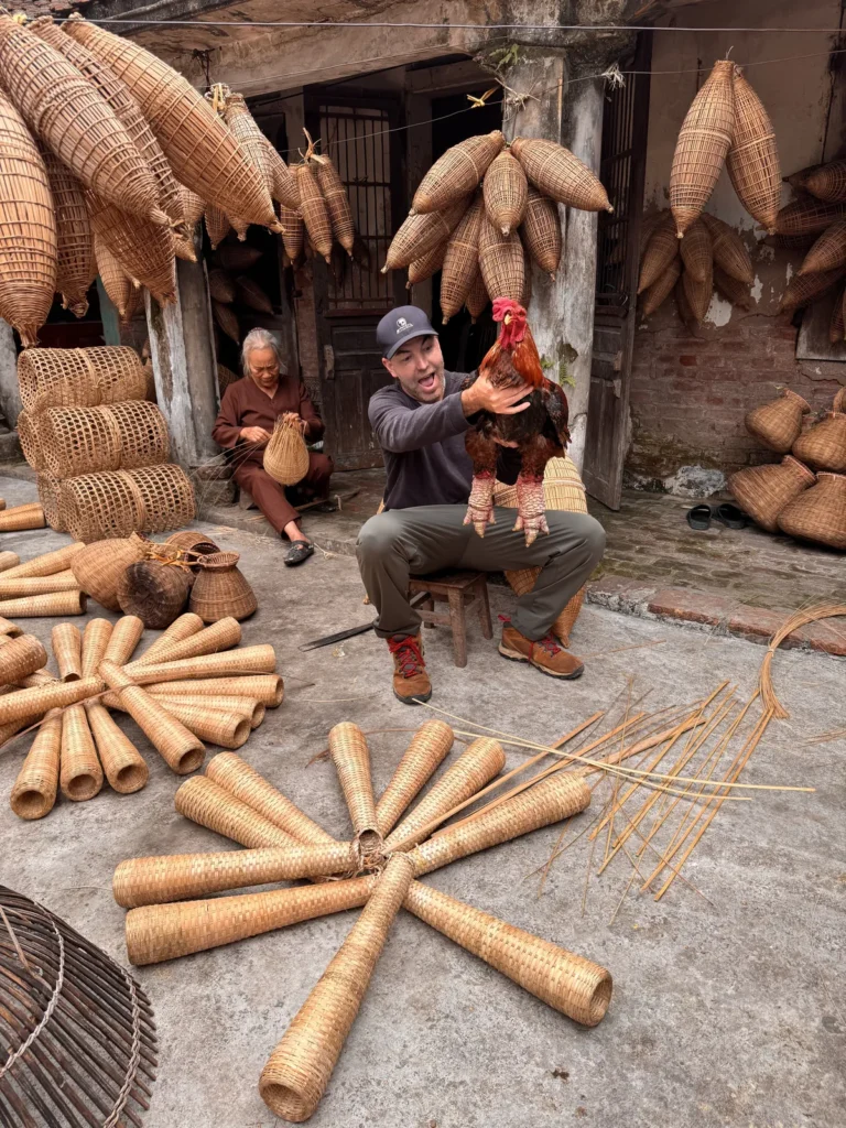 Hand-shaved bamboo strips and woven baskets in a Vietnamese village workshop, showing the handmade process